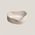 Ceramic bowl on a light gray background